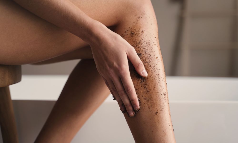 Women using coffee scrub for exfoliation